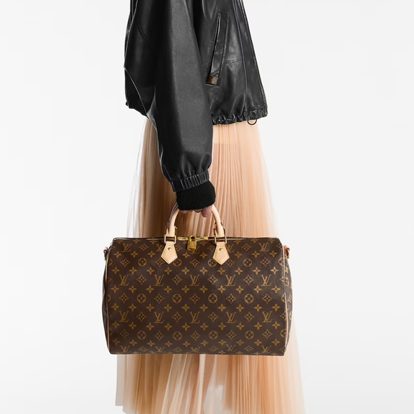 Louis Vuitton Speedy Handbag with Lock and Strap - Picture 1 of 16